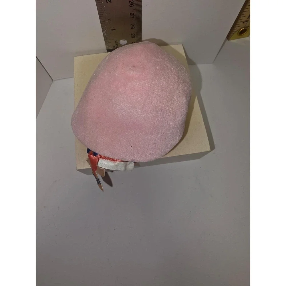Disney Little Mermaid Caspia mini plush features a soft, light pink hairstyle